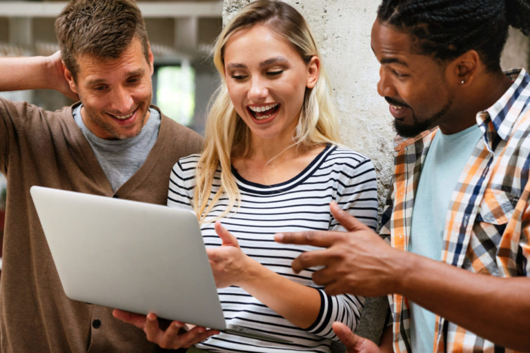 Collaborative process of multicultural skilled people during brainstorming meeting in office